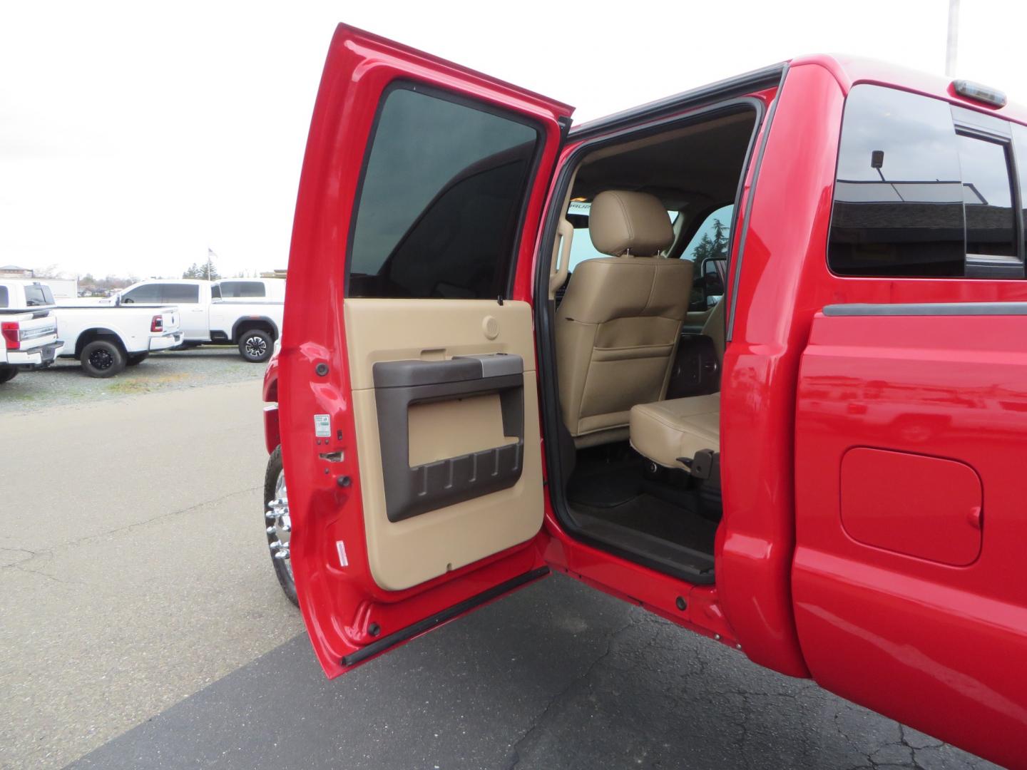 2014 Red /TAN Ford F450 Super Duty Crew Cab Lariat Crew Cab 4WD (1FT8W4DT7EE) with an V8 Turbo Diesel 6.7 Liter engine, Automatic 6-Spd w/SelectShift transmission, located at 2630 Grass Valley Highway, Auburn, CA, 95603, (530) 508-5100, 38.937893, -121.095482 - Wow!! 14 F450 sitting on Icon Vehicle Dynamics suspension, 24" American Force wheels, 37" tires, Rough Country back up leds, Light bar, Window tint, Smoked tail lights 3rd brake light, cab lights, and marker lights, Air bags with compressor, and train horns. Must see this head turner! - Photo#46